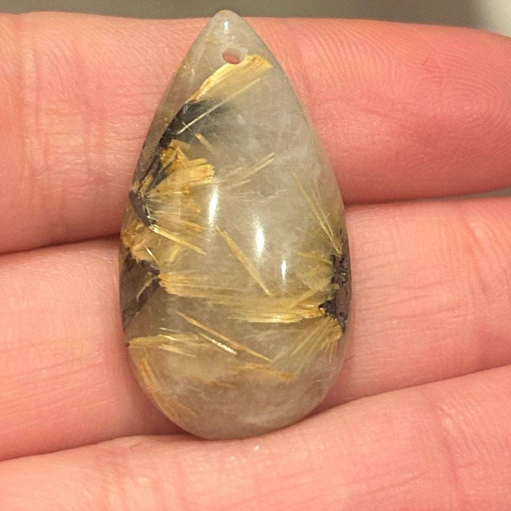 Golden rutile star 🌟 with hematite inclusions Elegant Teardrop Pendant